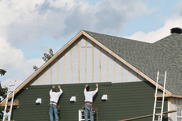Professional Siding technician working in McClure, PA